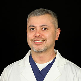 Dr. Charles J. Gutierrez